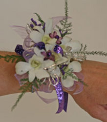 White and purple dendrobium orchid wrist corsage from The Posie Shoppe in Prineville, OR