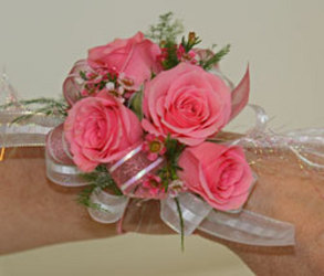 Pink spray rose wrist corsage from The Posie Shoppe in Prineville, OR