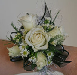 Black and white spray rose wrist corsage from The Posie Shoppe in Prineville, OR