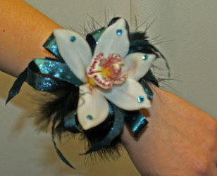 Teal and black cymbidium orchid corsage from The Posie Shoppe in Prineville, OR