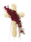 White cross with roses from The Posie Shoppe in Prineville, OR