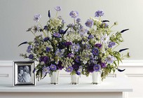 Wildflowers in silver vases