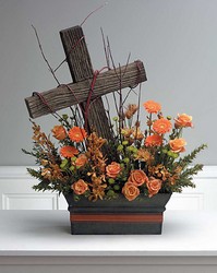 Driftwood cross in floral hedge from The Posie Shoppe in Prineville, OR