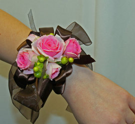 Pink and brown rose wristlet corsage from The Posie Shoppe in Prineville, OR