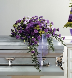 Purple and lavender carnation casket spray from The Posie Shoppe in Prineville, OR