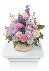 Pink and lavender basket arrangement from The Posie Shoppe in Prineville, OR