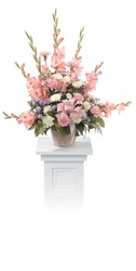 Pastel garden basket arrangement from The Posie Shoppe in Prineville, OR