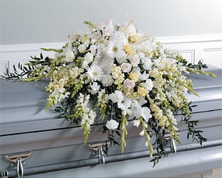 White Casket Spray with knitting accents from The Posie Shoppe in Prineville, OR